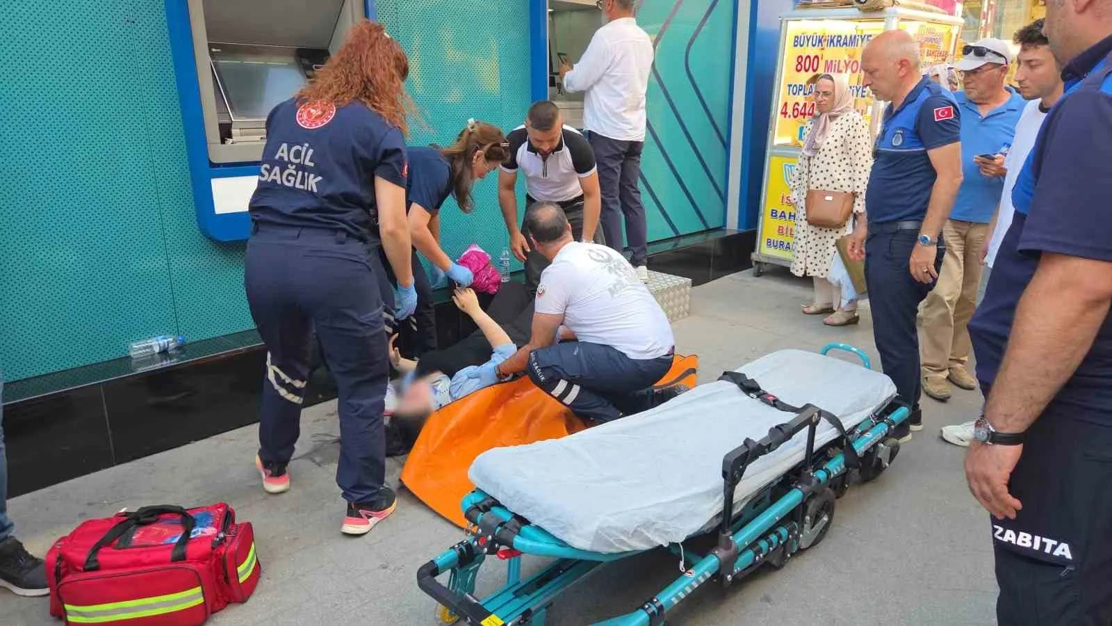 Samsun'da kavurucu sıcaklar can yaktı: ATM önünde fenalaşan hamile kadın hastanelik oldu